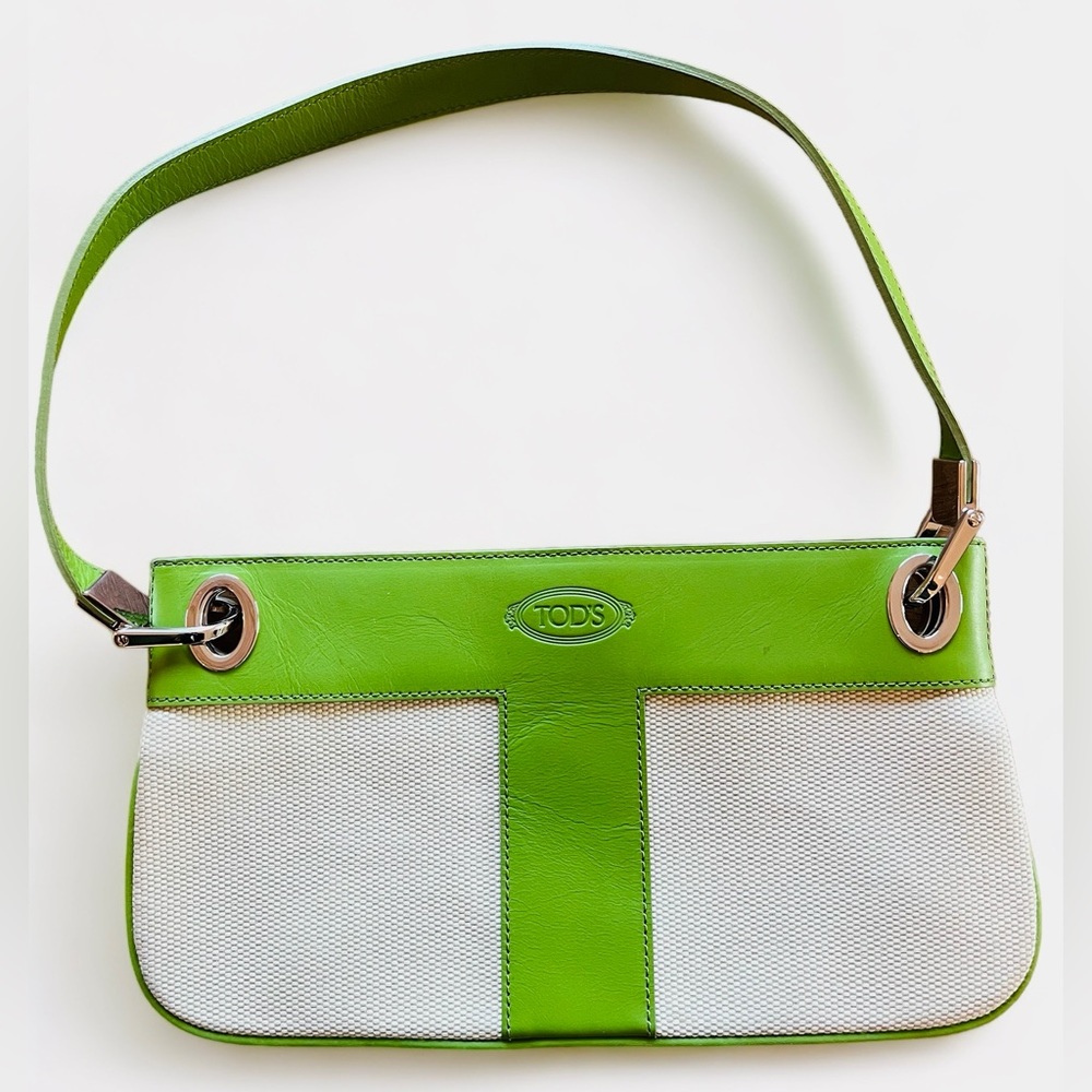 Authentic Tod’s mini bag with green leather lining and strap!